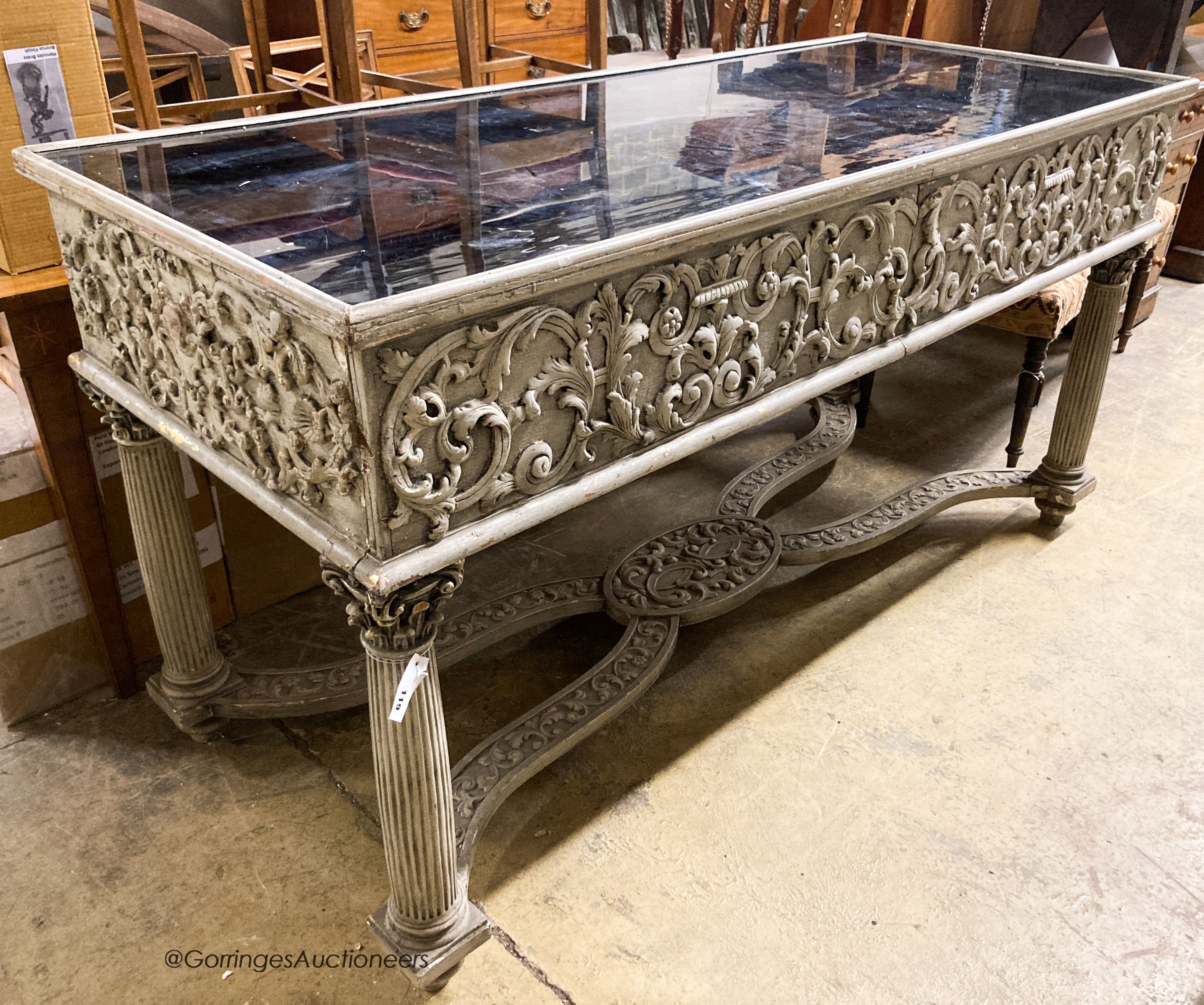 An 18th century style painted two drawer glass top console table, width 180cm, depth 73cm, height 95cm